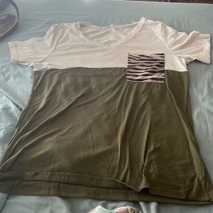 Green and white with a leopard print pocket.